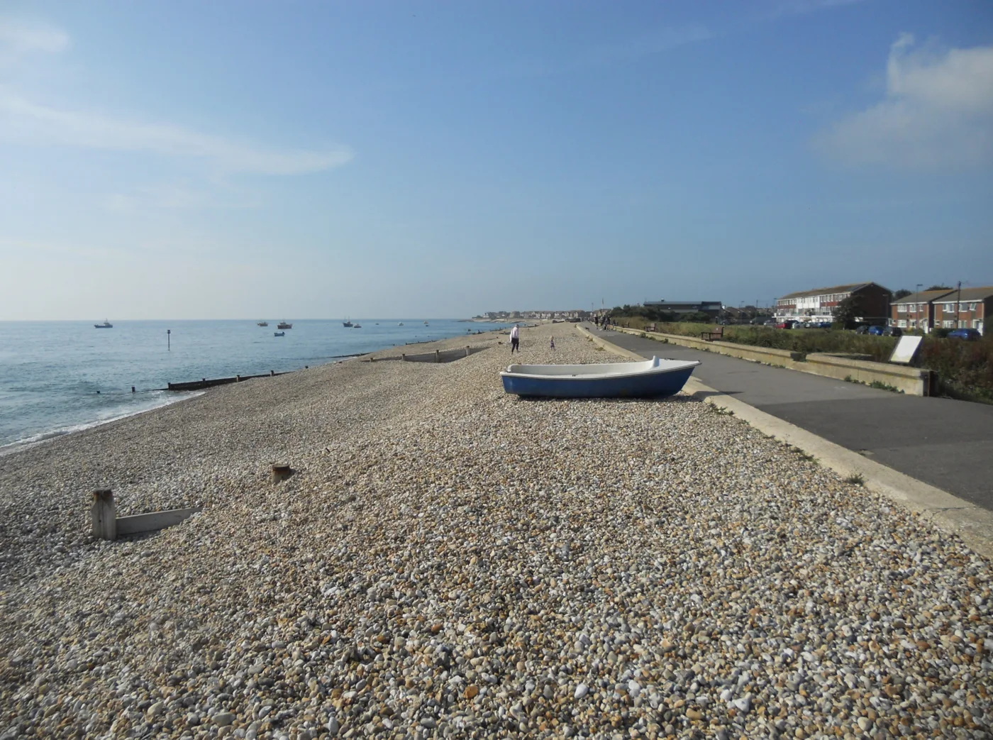 The Selsey seafront, with the promenade and seawall running behind the shingle. The strengthening work is on a separate section at the western end of the town