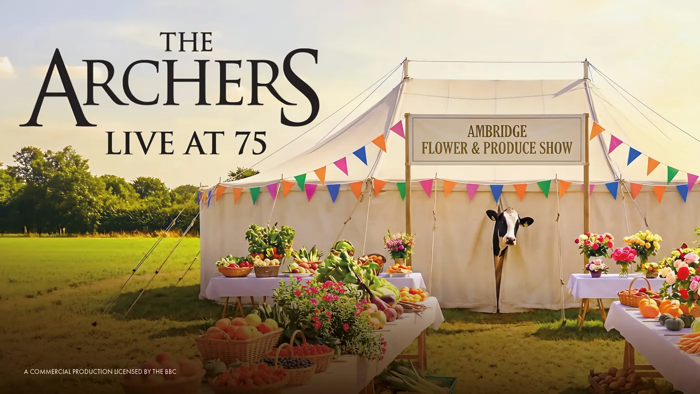 Tour artwork: The Archers Live at 75 title beside a marquee signed Ambridge Flower and Produce Show, with bunting, flowers, vegetables and a cow in a green field