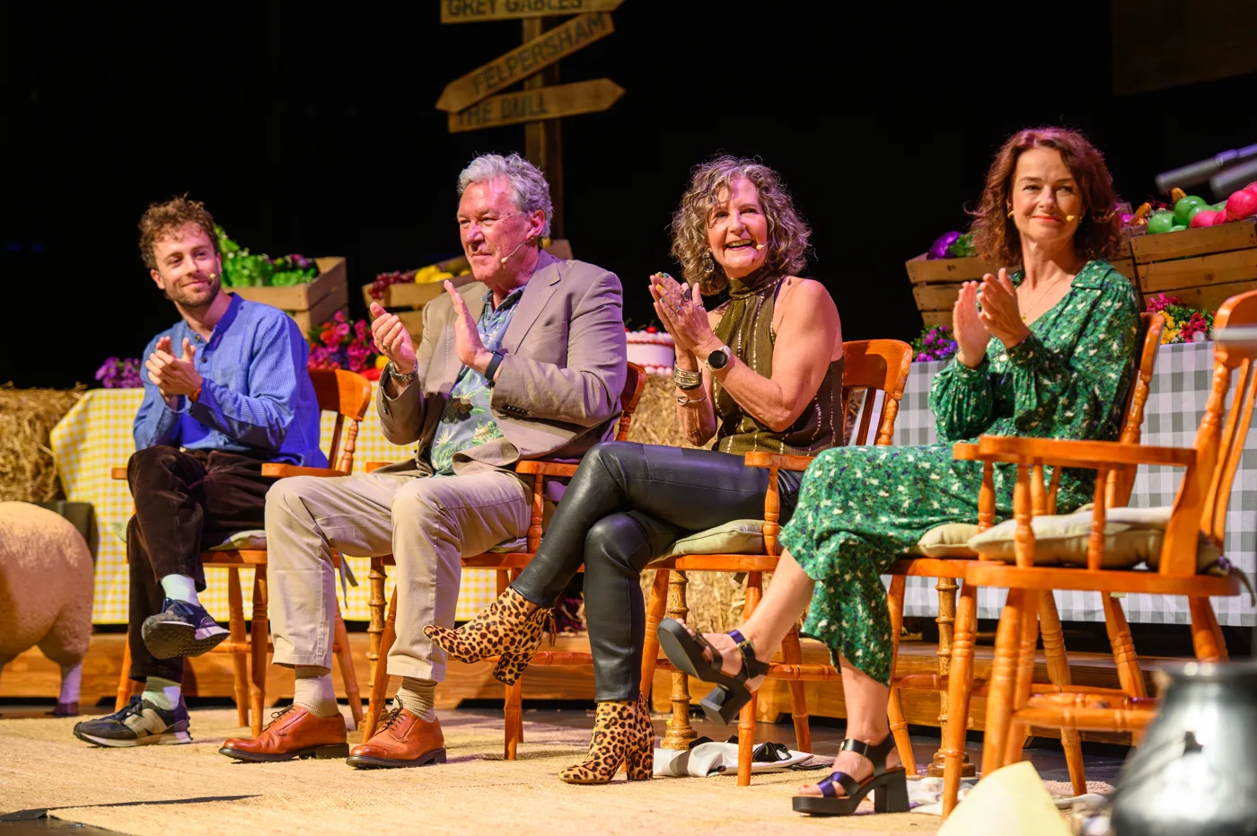 Four cast members on stage during The Archers: Live at 75